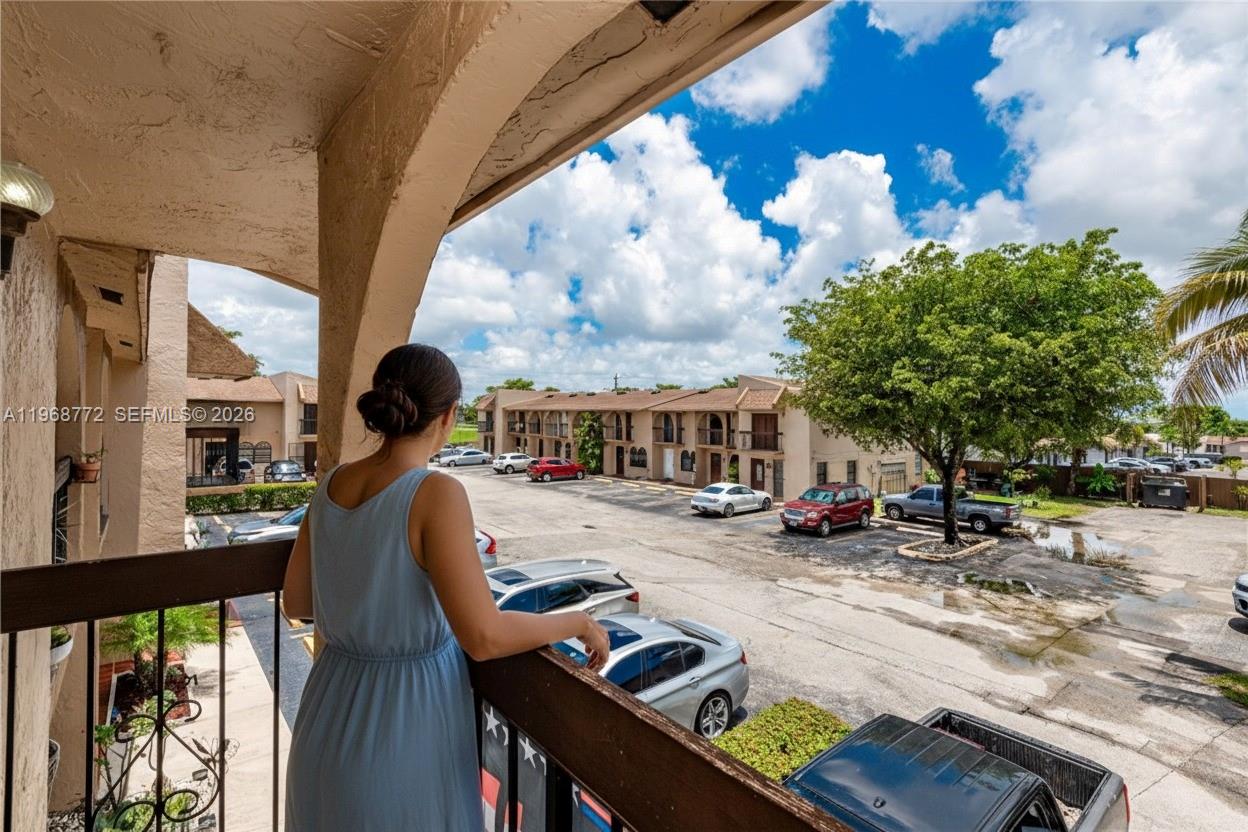 1082 West 79th Street, Unit 25 Hialeah, FL 33014 - Photo 14 of 16 a view of yard with patio