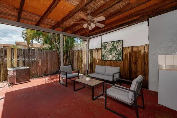 a building outdoor space with patio furniture