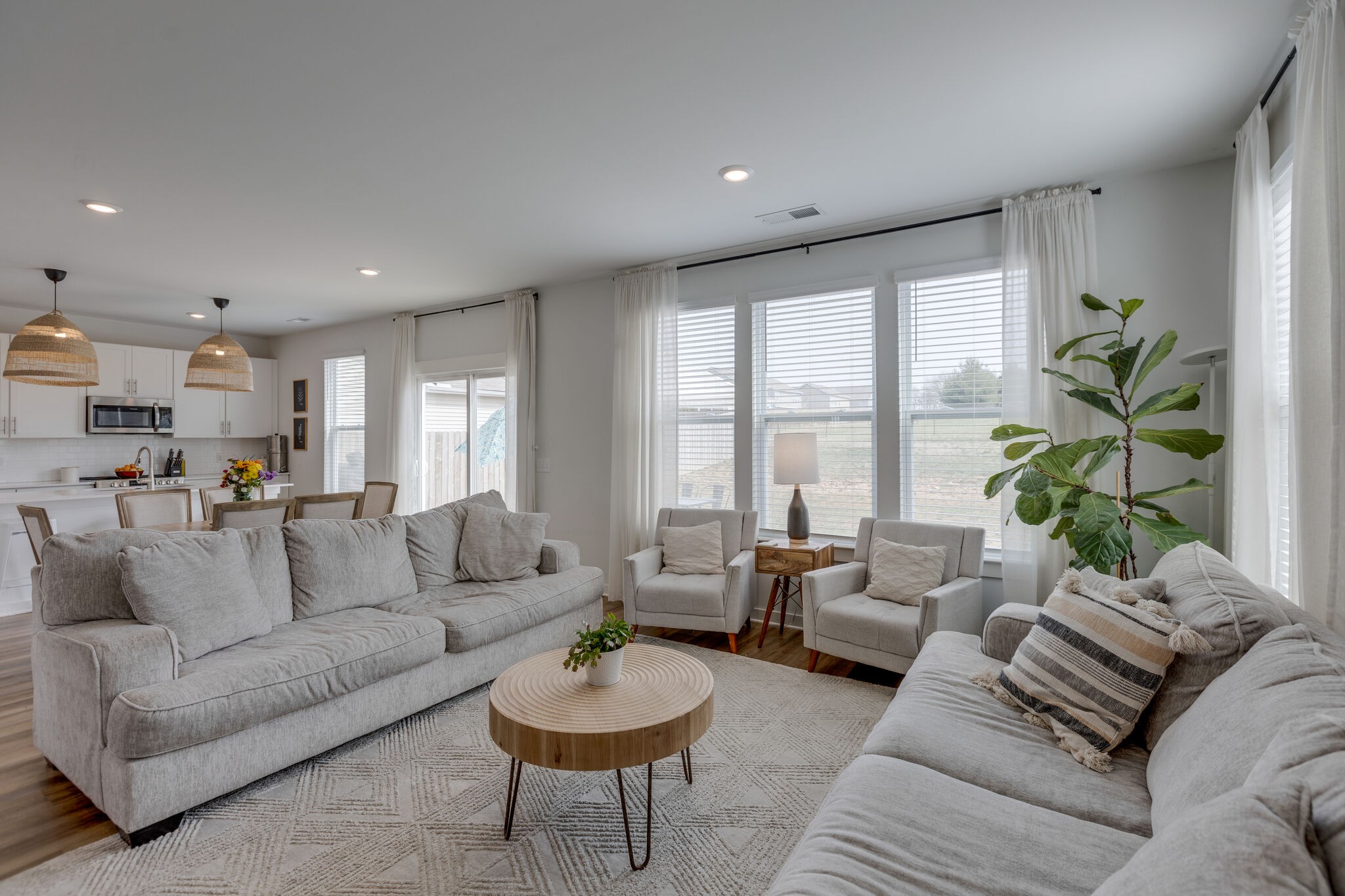 409 Irwin Way Spring Hill, TN 37174 - Photo 11 of 32 a living room with furniture and a large window
