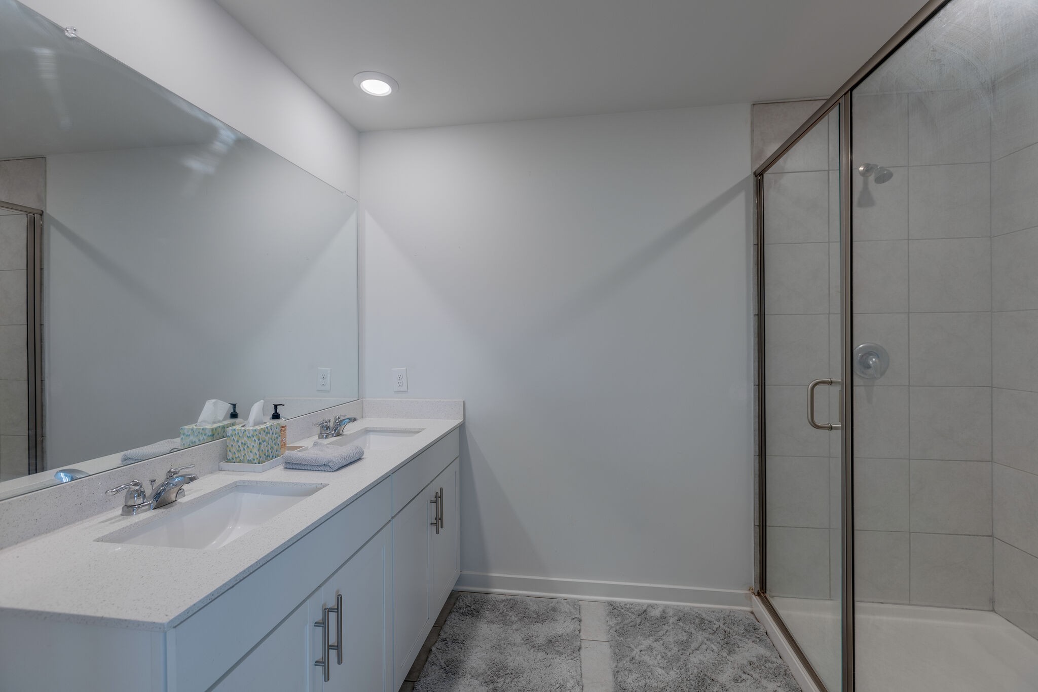 409 Irwin Way Spring Hill, TN 37174 - Photo 21 of 32 a bathroom with a sink and a mirror