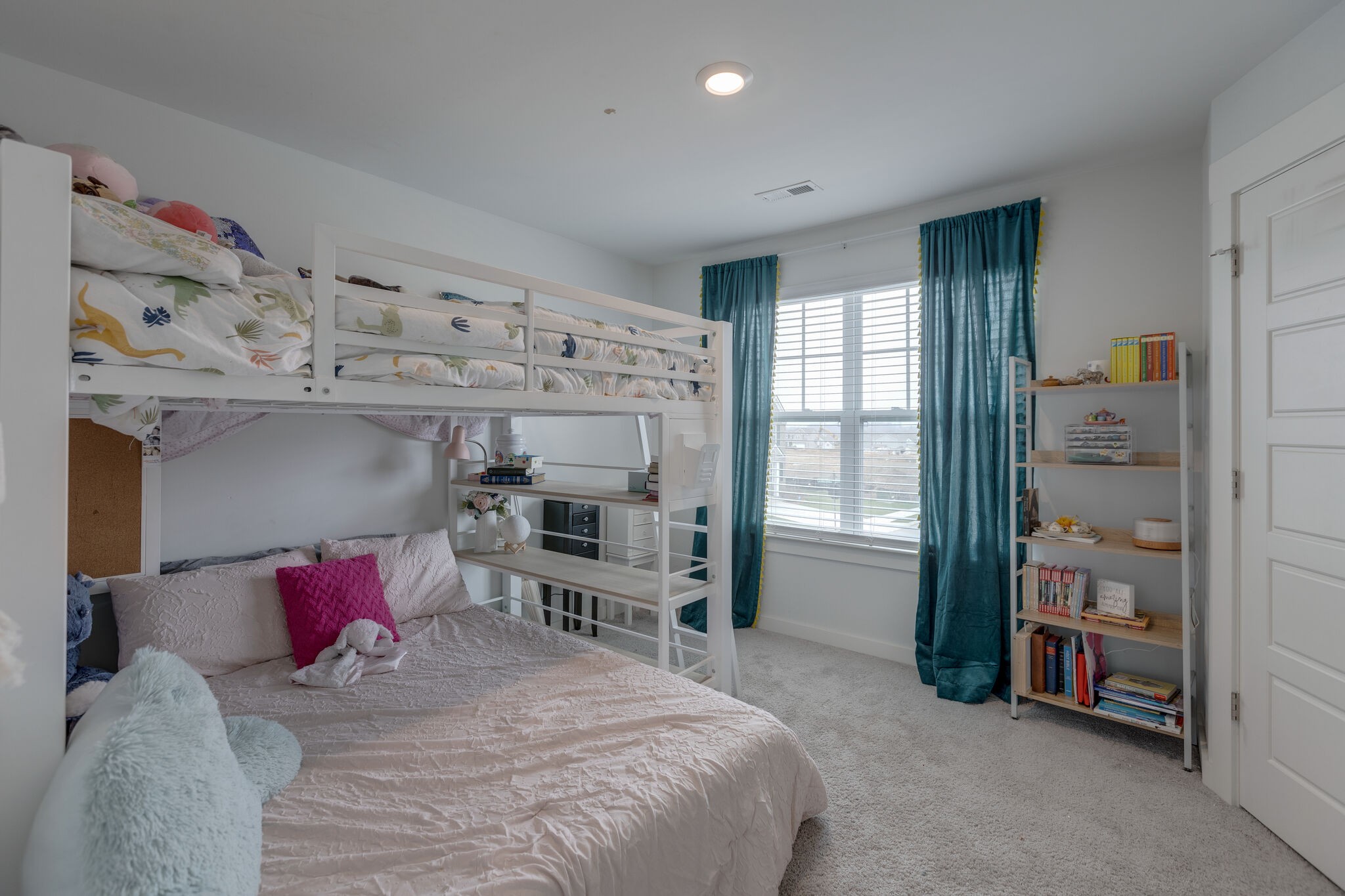 409 Irwin Way Spring Hill, TN 37174 - Photo 24 of 32 a bedroom with a bed and a window