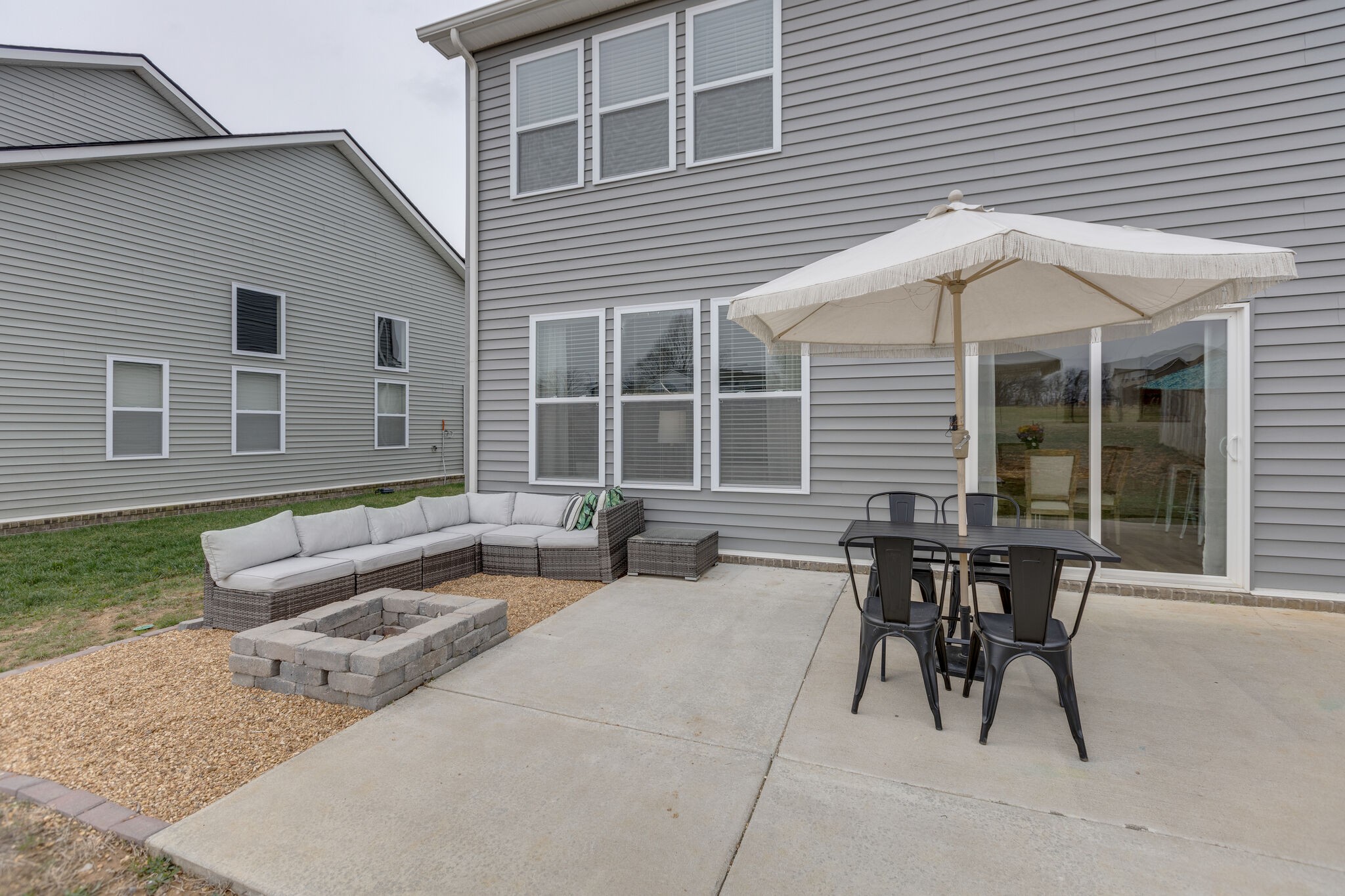 409 Irwin Way Spring Hill, TN 37174 - Photo 28 of 32 a view of a house with backyard and sitting area