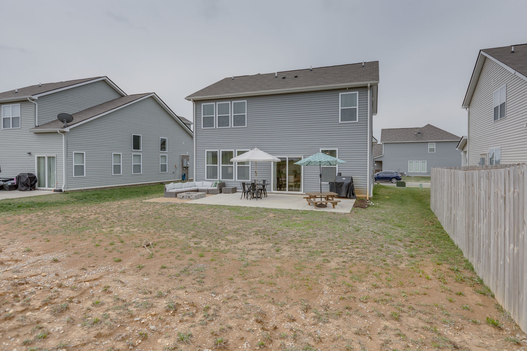 409 Irwin Way Spring Hill, TN 37174 - Photo 29 of 32 a view of a house with backyard and porch