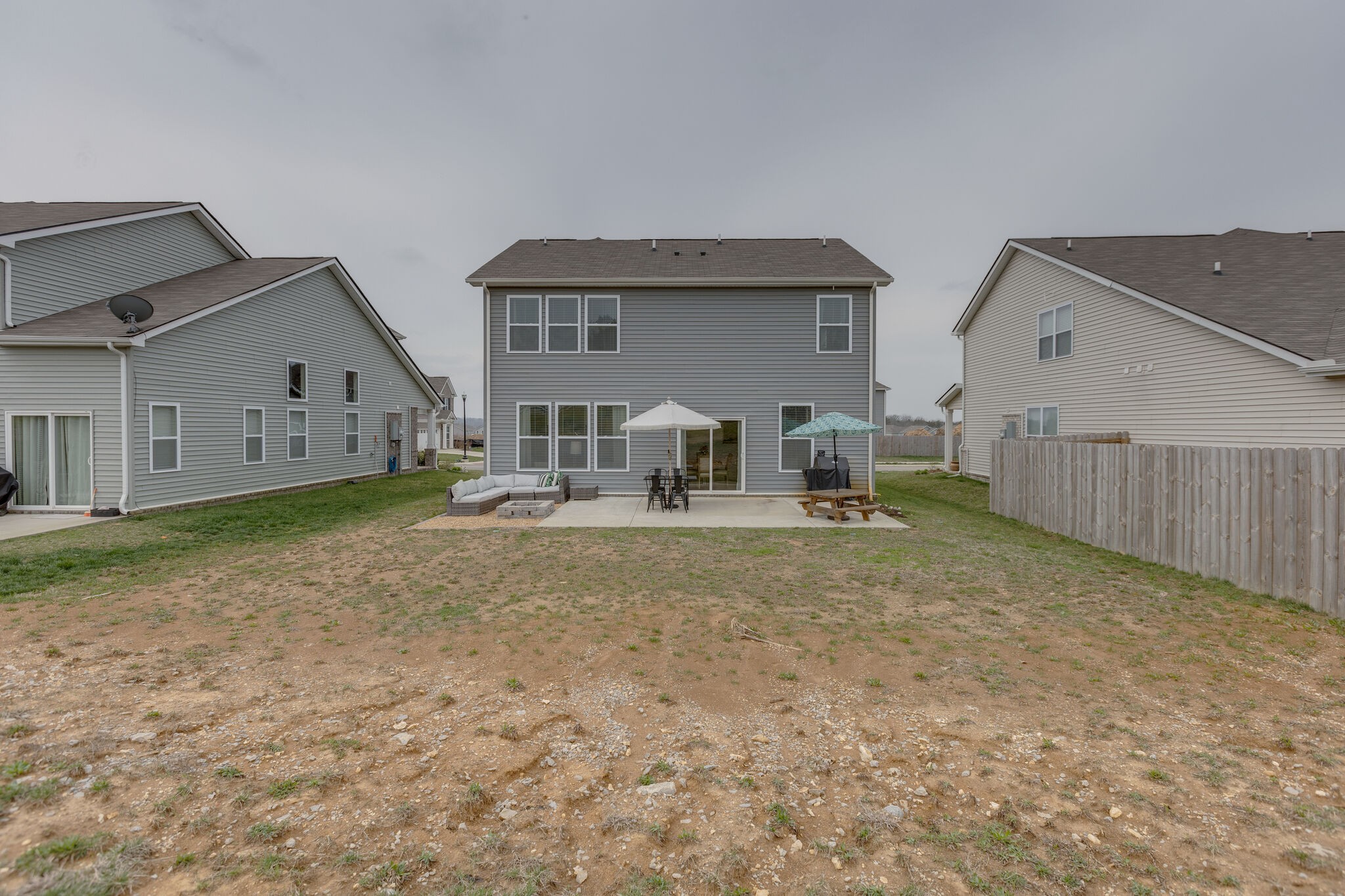 409 Irwin Way Spring Hill, TN 37174 - Photo 31 of 32 a view of a house with backyard