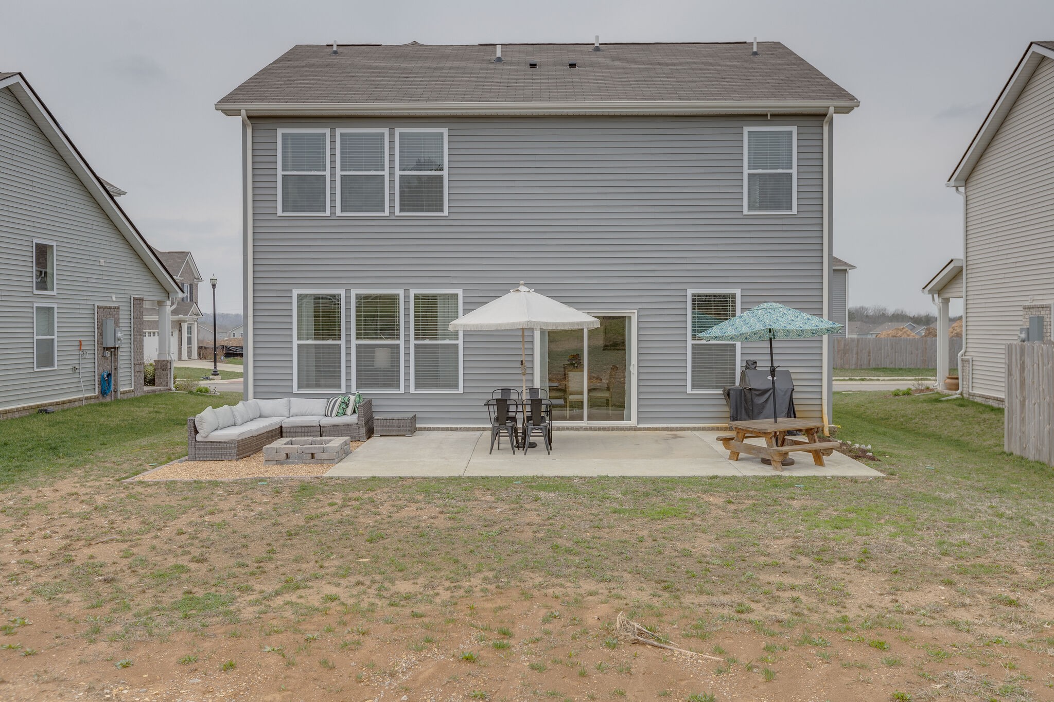 409 Irwin Way Spring Hill, TN 37174 - Photo 32 of 32 a front view of a house with sitting area and porch