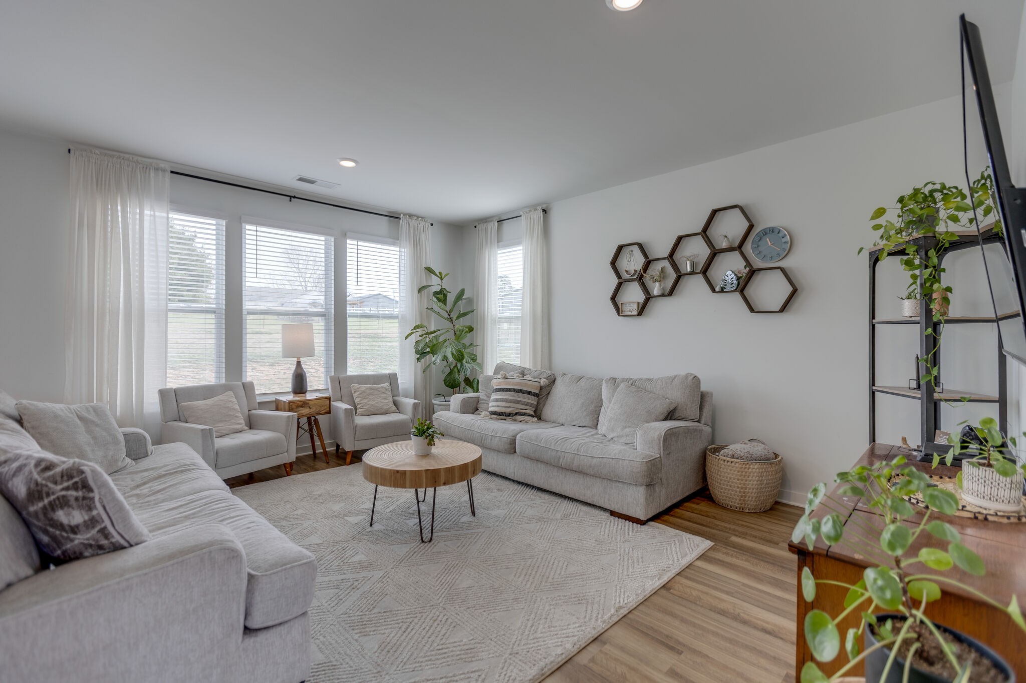 409 Irwin Way Spring Hill, TN 37174 - Photo 8 of 32 a living room with furniture and a large window