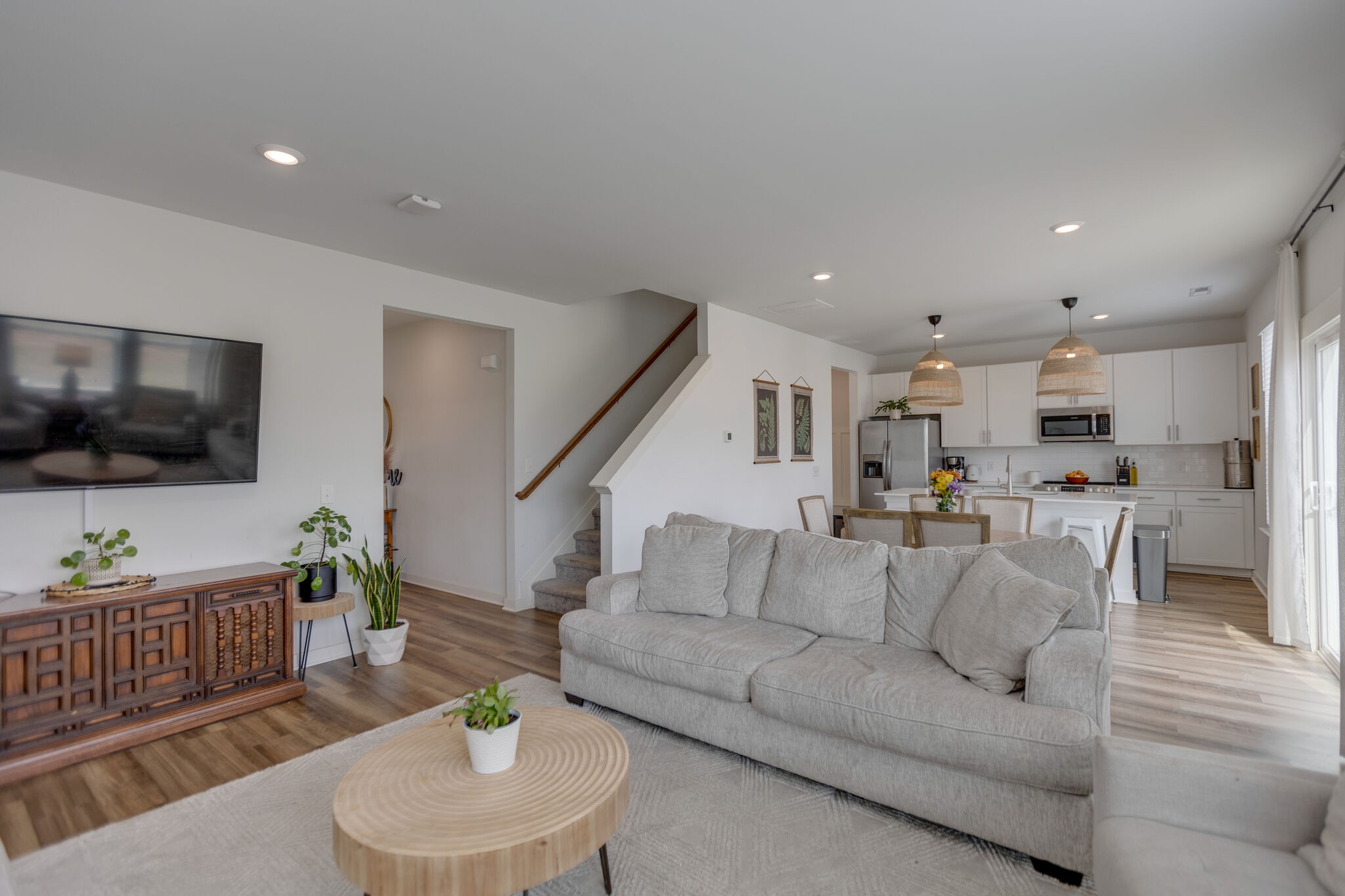 409 Irwin Way Spring Hill, TN 37174 - Photo 10 of 32 a living room with furniture and a flat screen tv