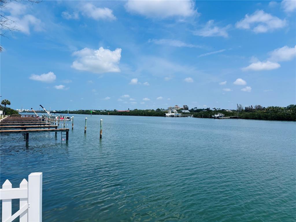 19417 Gulf Boulevard, Unit B209 Indian Rocks Beach, FL 33785 - Photo 18 of 24 a view of a lake with houses in back
