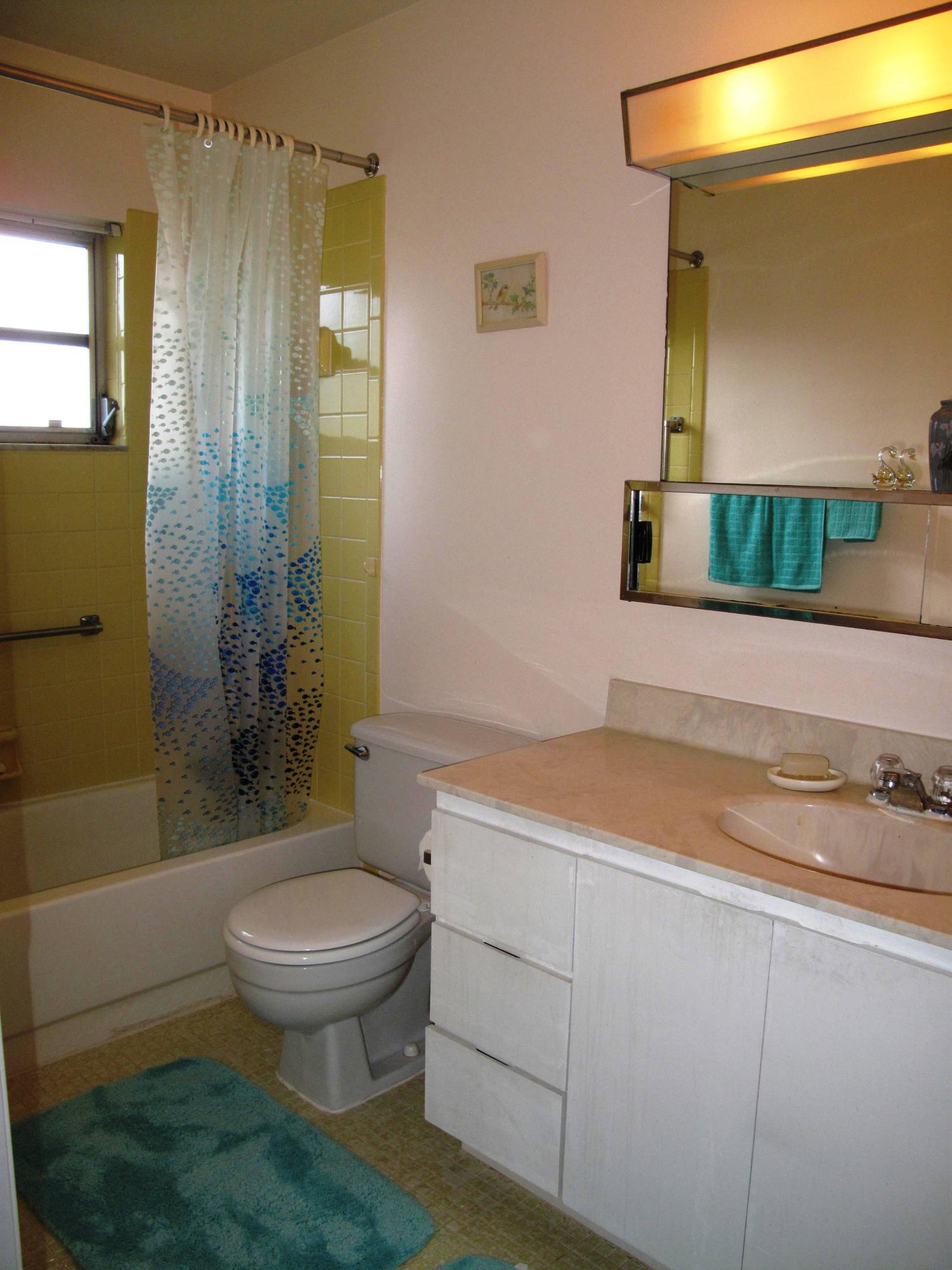 13960 Nesting Way, Unit A Delray Beach, FL 33484 - Photo 24 of 45 Master bathroom with combo shower and tu