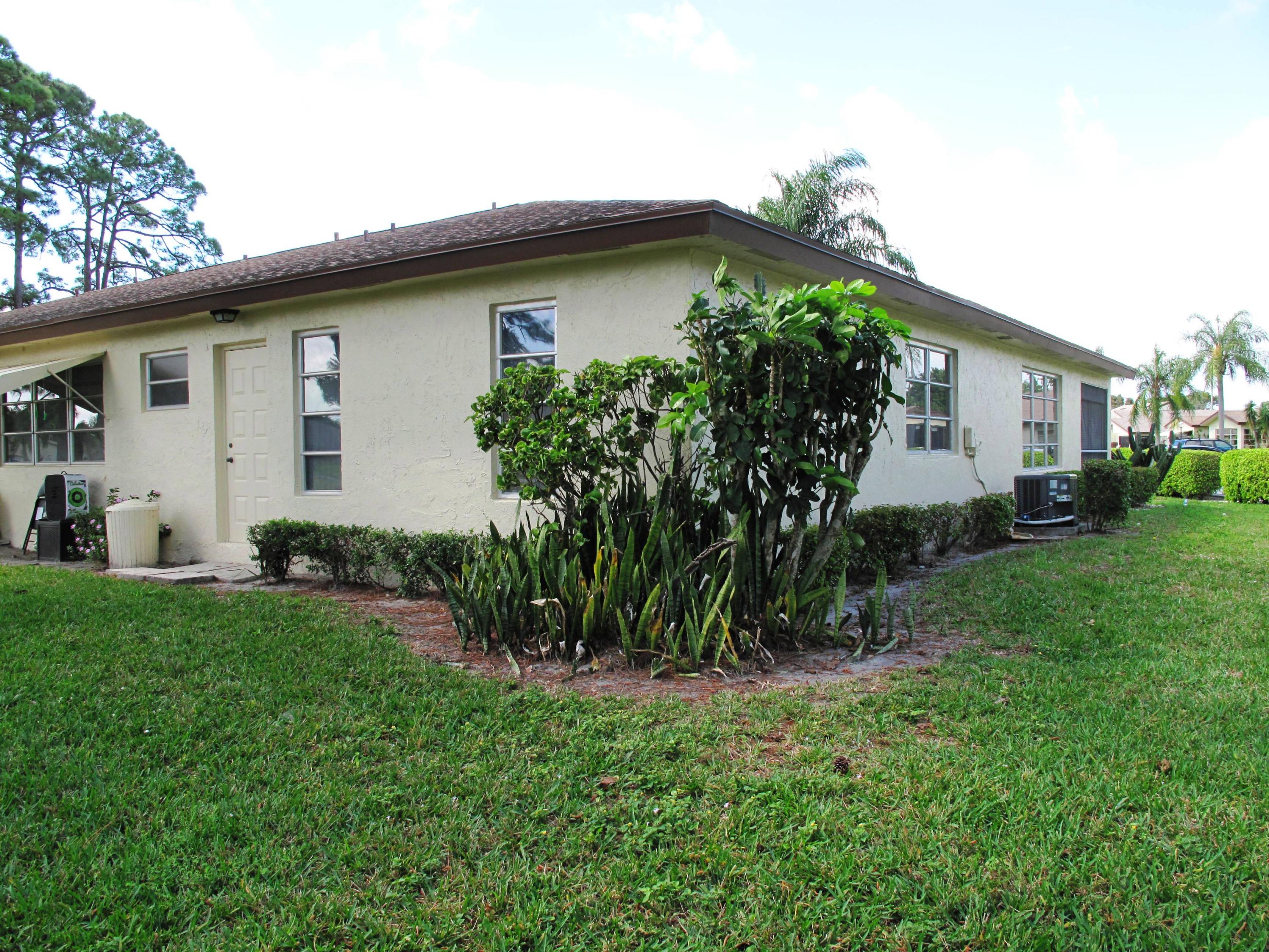 13960 Nesting Way, Unit A Delray Beach, FL 33484 - Photo 33 of 45 Rear view of corner villa
