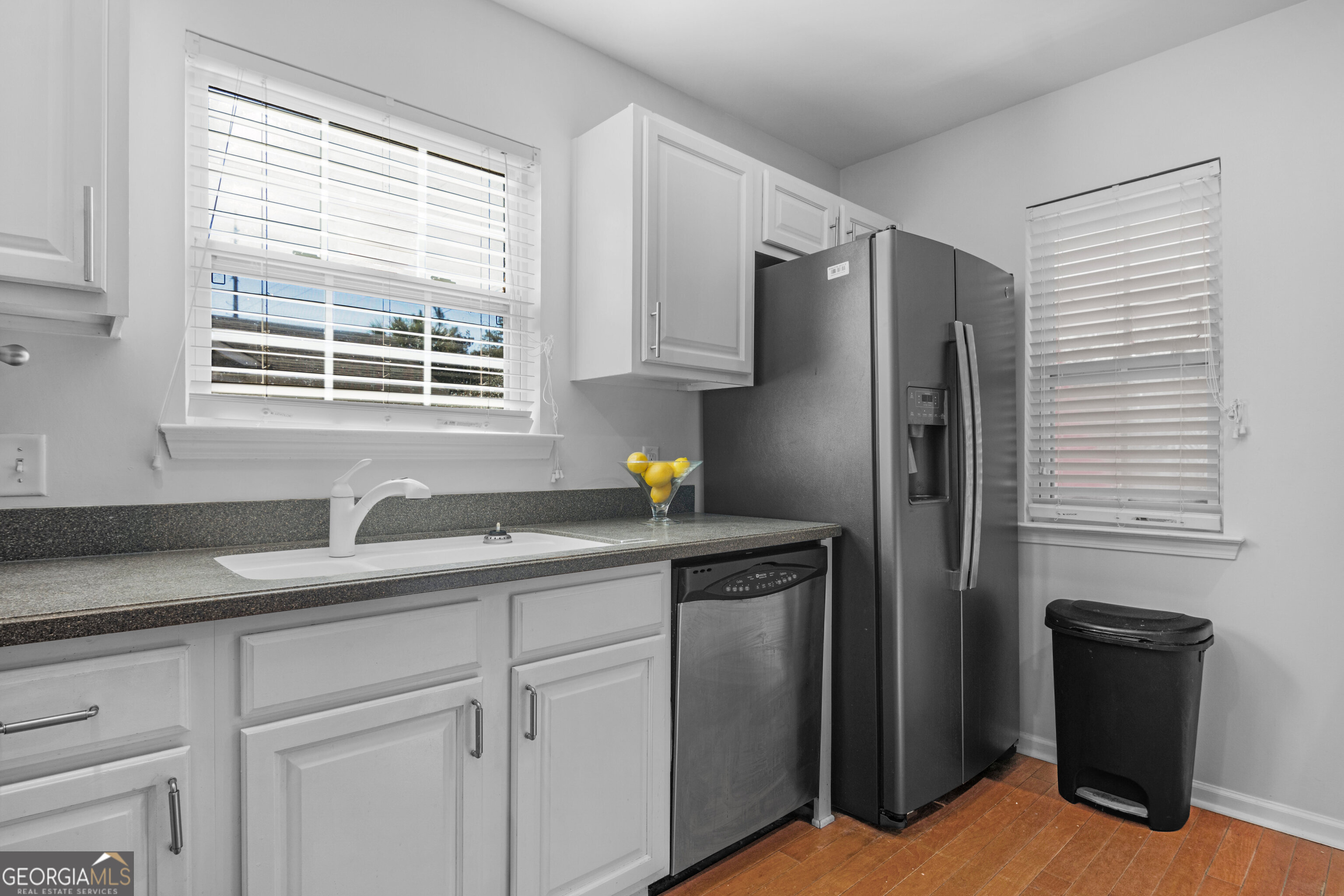 172 Sonata Circle Pooler, GA 31322 - Photo 7 of 48 a kitchen with a refrigerator and a sink