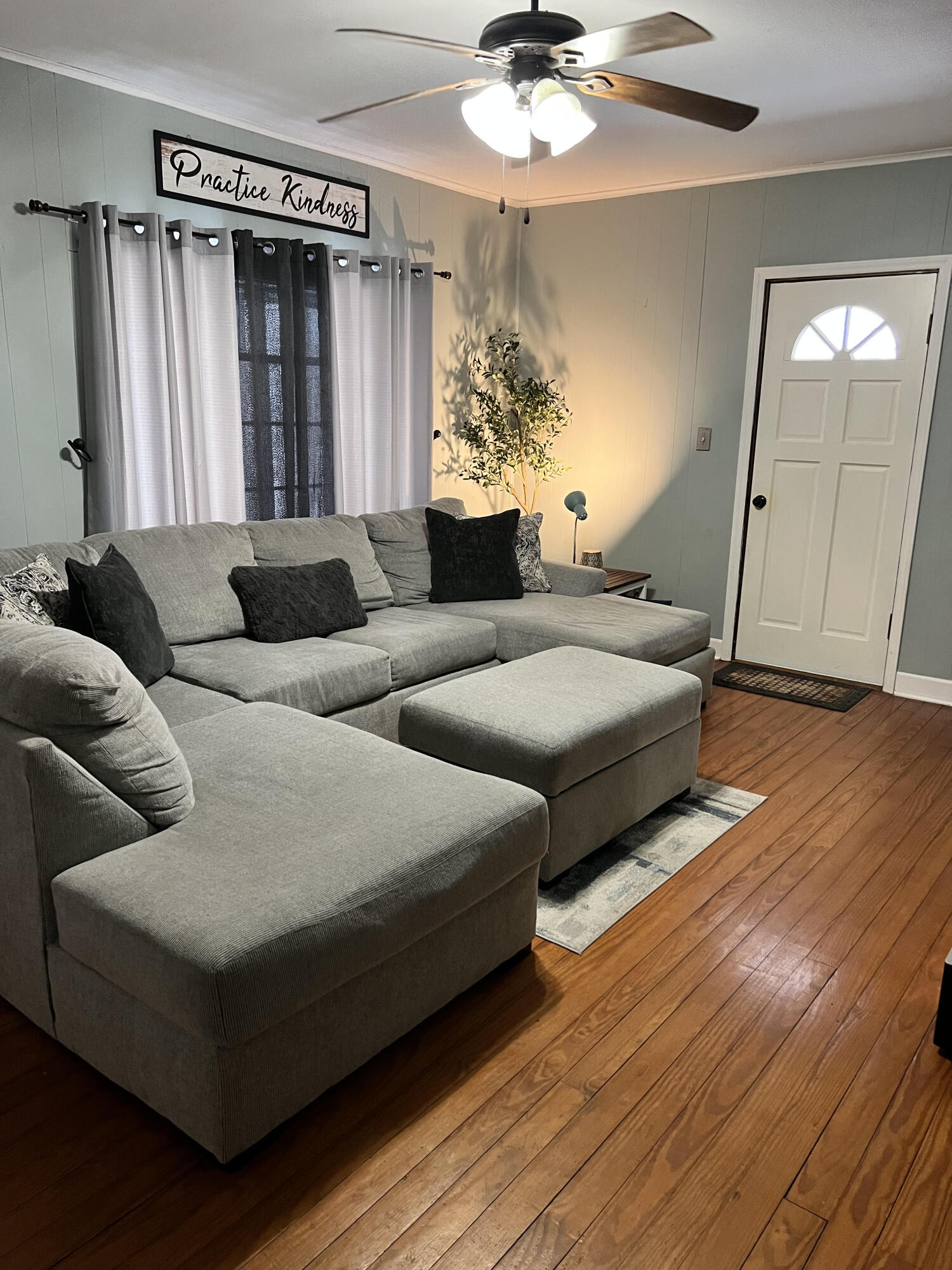 4304 Bandy Road Roanoke, VA 24014 - Photo 4 of 17 a living room with couches and a chandelier