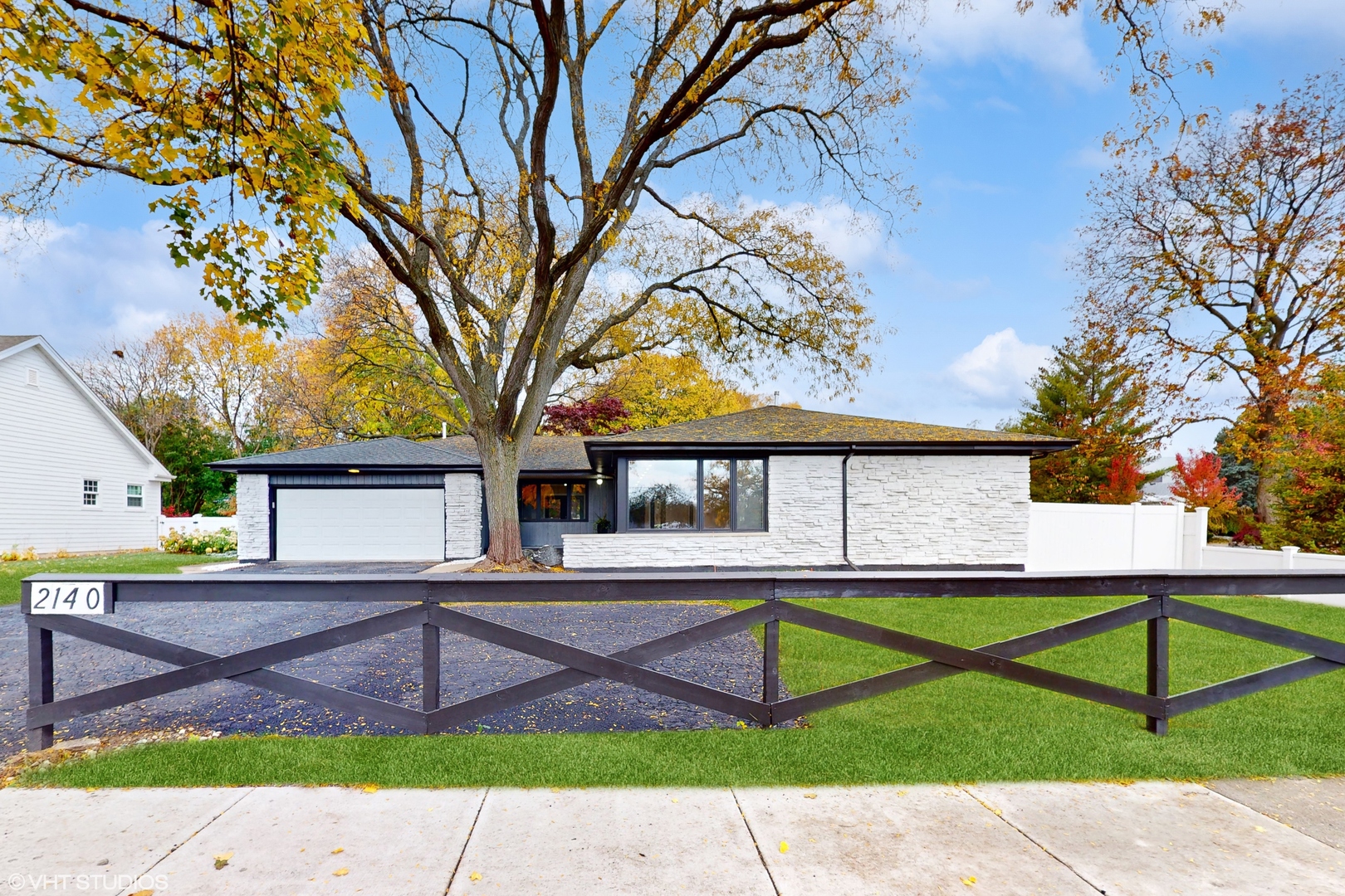 2140 Pfingsten Road Northbrook, IL 60062 - Photo 1 of 44 a house that has tree in front of it