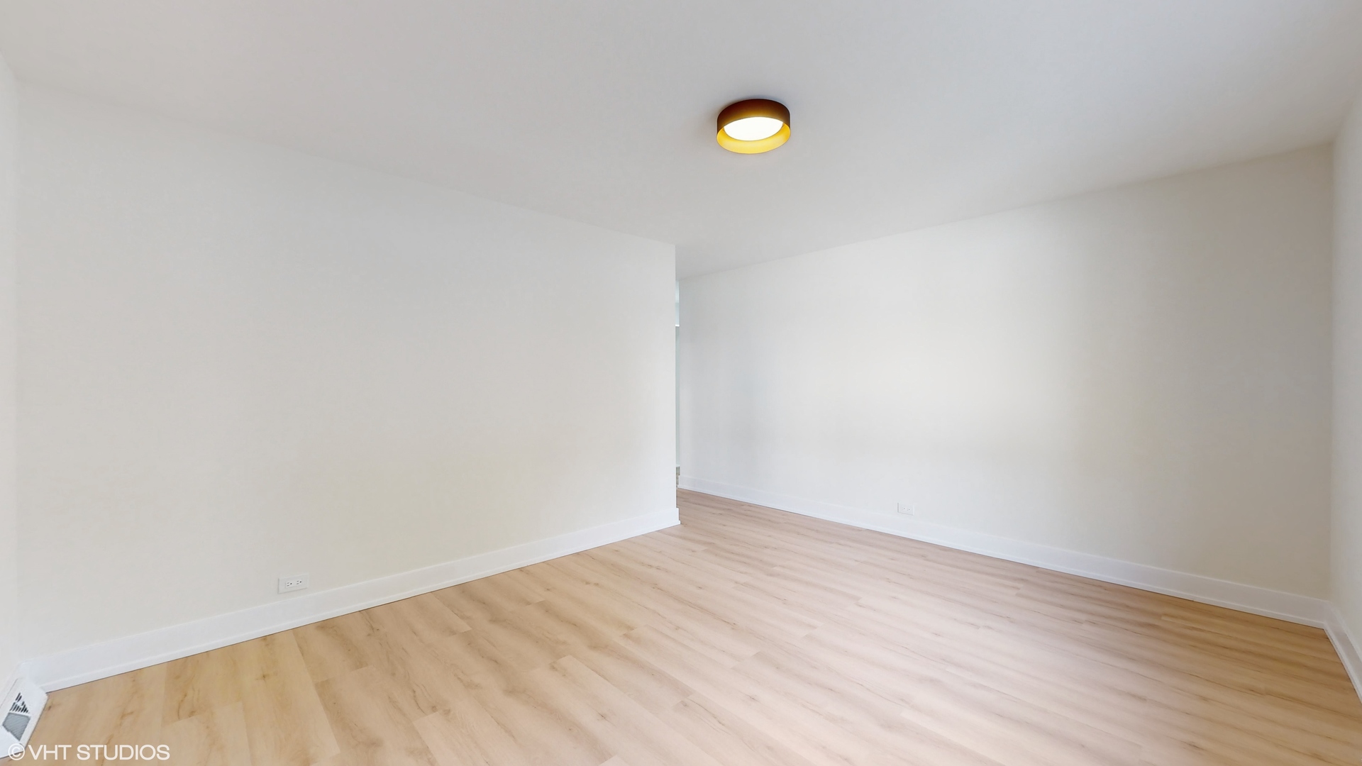 2140 Pfingsten Road Northbrook, IL 60062 - Photo 17 of 44 a view of a wall with wooden floor