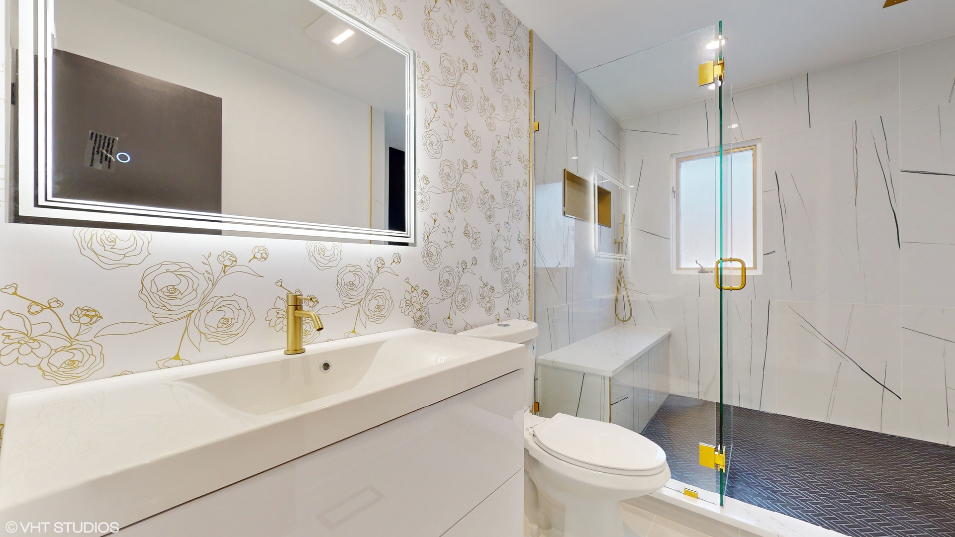 2140 Pfingsten Road Northbrook, IL 60062 - Photo 19 of 44 a bathroom with a sink a toilet and shower