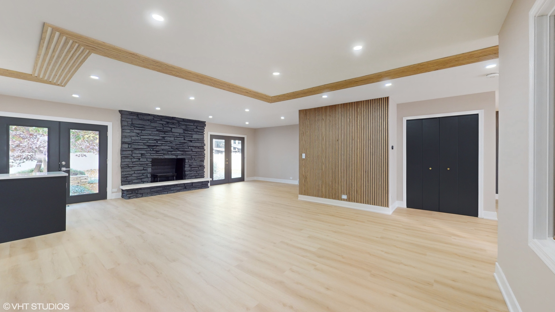 2140 Pfingsten Road Northbrook, IL 60062 - Photo 9 of 44 a view of an empty room with window and fire place