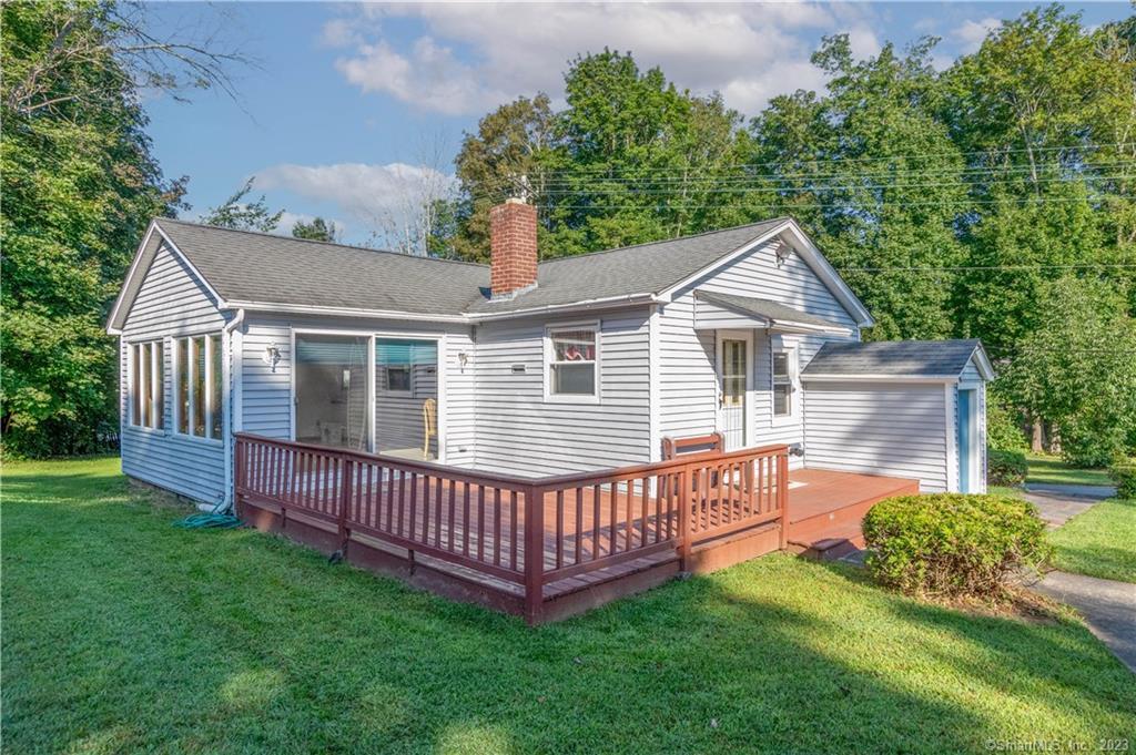 700 Norwich Road Plainfield, CT 06374 - Photo 1 of 1 a view of a house with a yard and deck