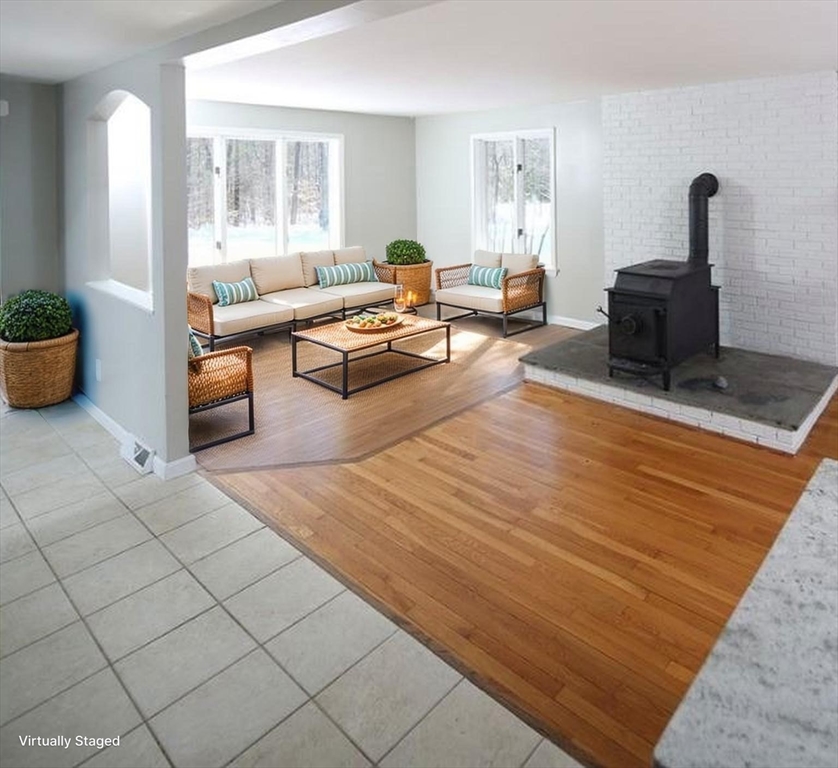 731 R Grove Street Norwell, MA 02061 - Photo 12 of 42 a living room with furniture and a table