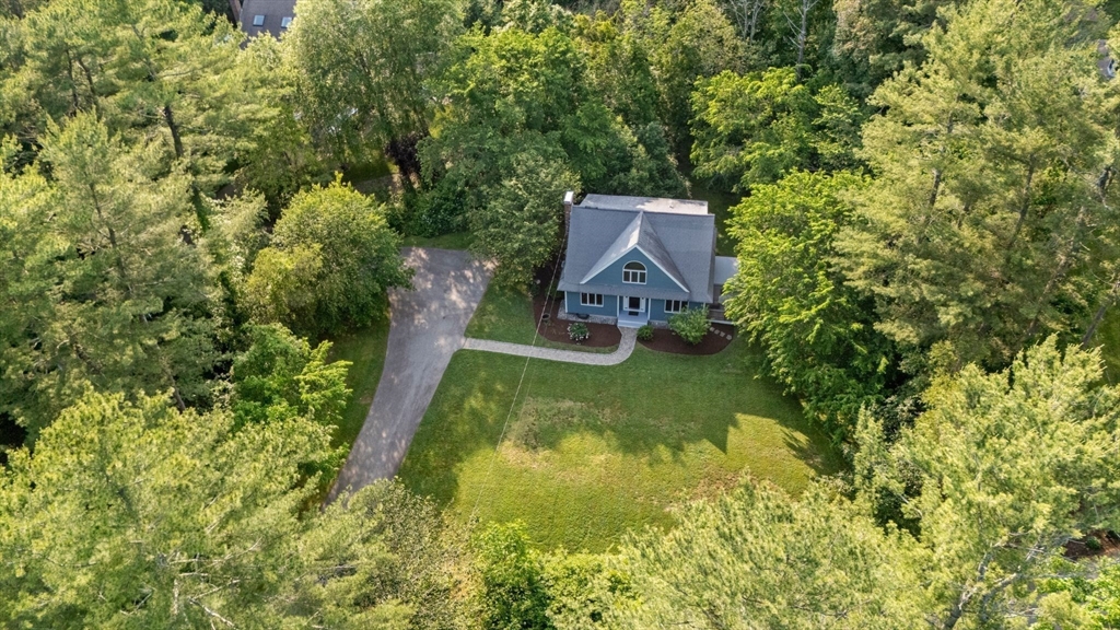 731 R Grove Street Norwell, MA 02061 - Photo 2 of 42 a aerial view of a house with swimming pool