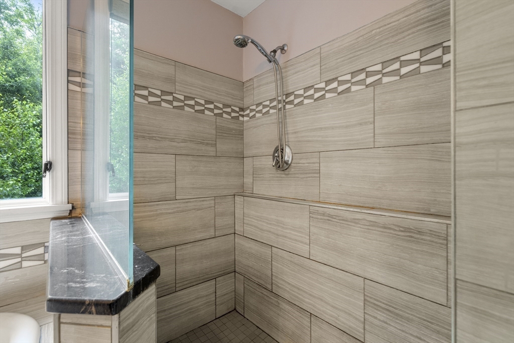 731 R Grove Street Norwell, MA 02061 - Photo 24 of 42 a bathroom with a shower