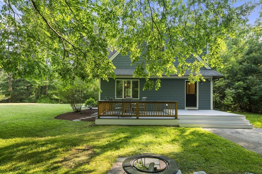 731 R Grove Street Norwell, MA 02061 - Photo 34 of 42 a view of a house with backyard and a patio