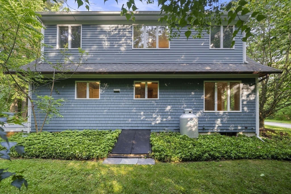 731 R Grove Street Norwell, MA 02061 - Photo 38 of 42 a view of house with a yard