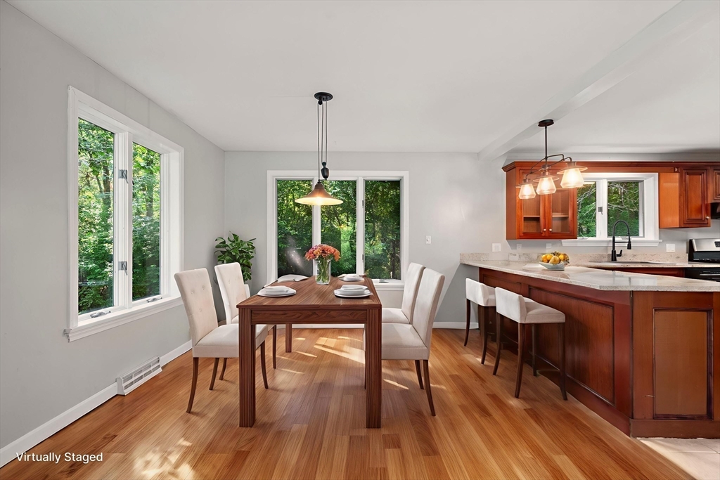 731 R Grove Street Norwell, MA 02061 - Photo 6 of 42 a view of a dining room with furniture window and outside view