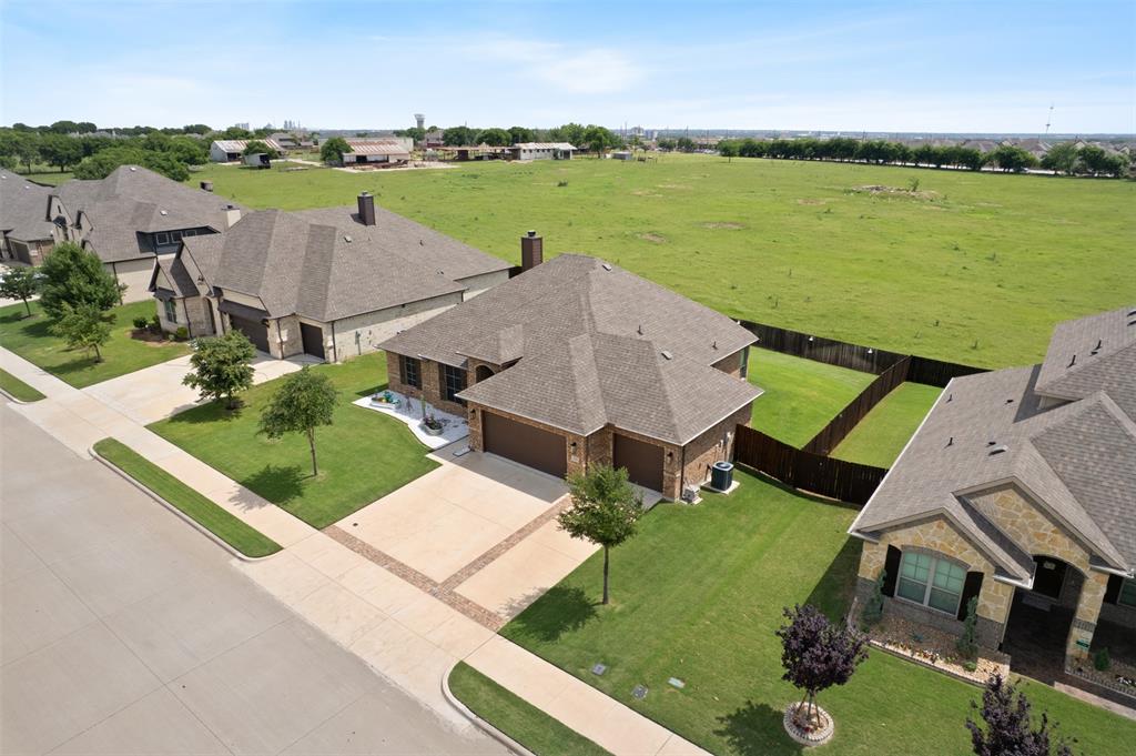 2618 Byrd Ranch Road Midlothian, TX 76065 - Photo 3 of 38 an aerial view of a house with outdoor space and a lake view in back