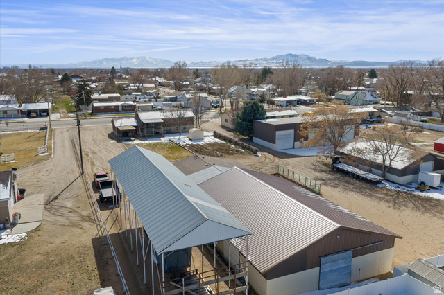 2298 West 800 North Clinton, UT 84015 - Photo 48 of 53 Aerial view of residential area with a mountainous background