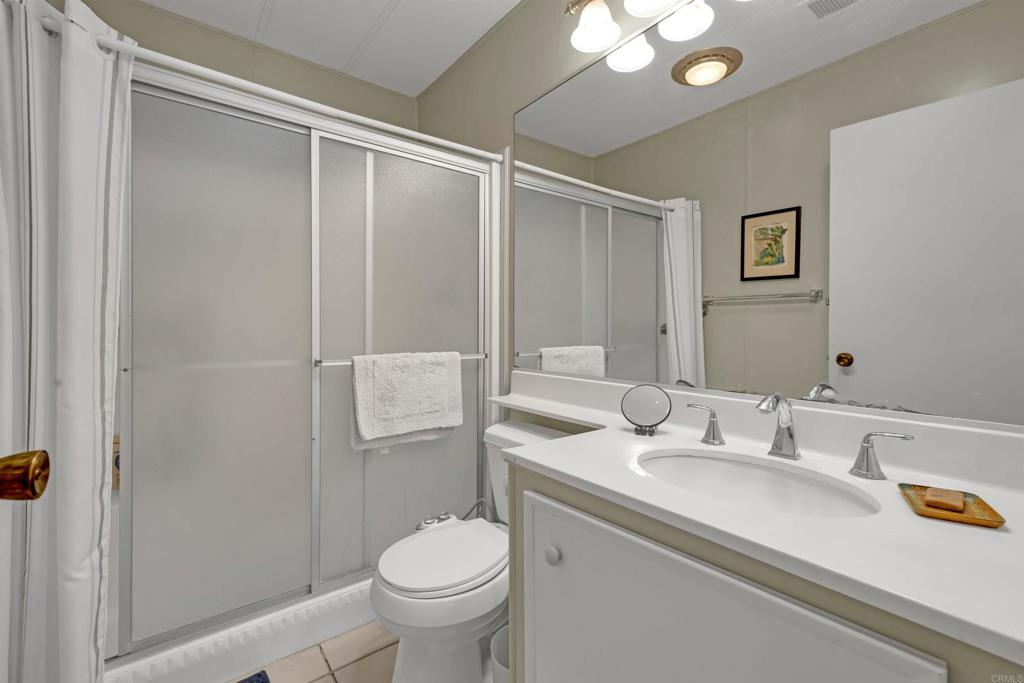 1010 Palm Canyon Drive, Unit 151 Borrego Springs, CA 92004 - Photo 19 of 31 a bathroom with a sink toilet and shower