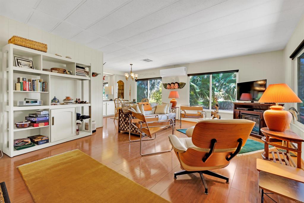 1010 Palm Canyon Drive, Unit 151 Borrego Springs, CA 92004 - Photo 7 of 31 a living room with furniture a rug and a large window