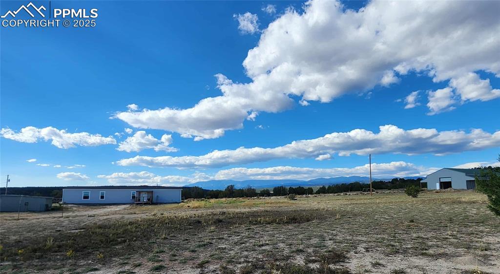 a view of a big yard of a house