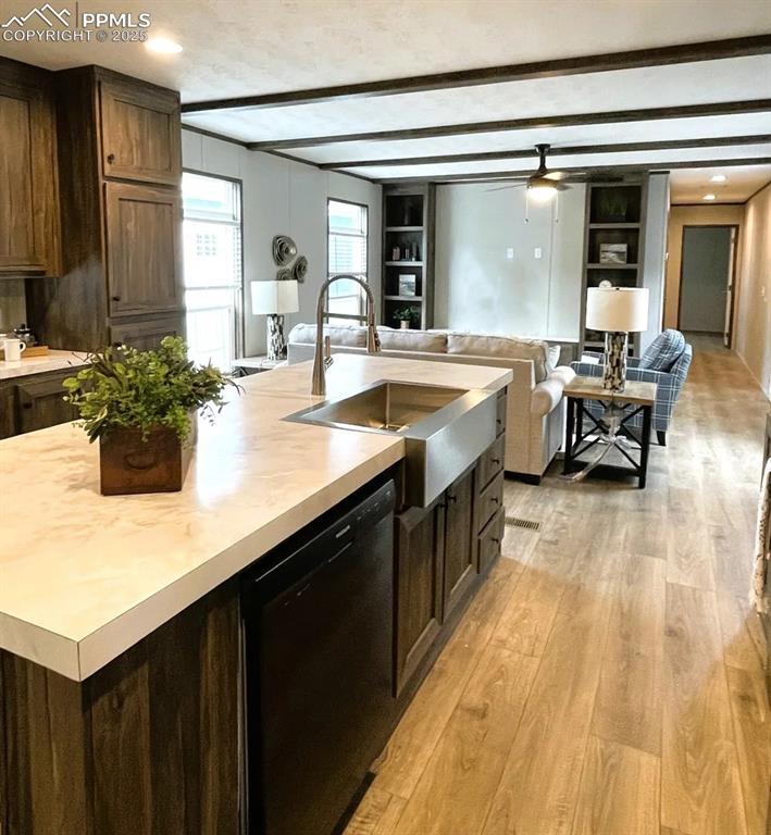 7490 Red Creek Springs Road Pueblo, CO 81005 - Photo 14 of 37 a kitchen with a sink and cabinets