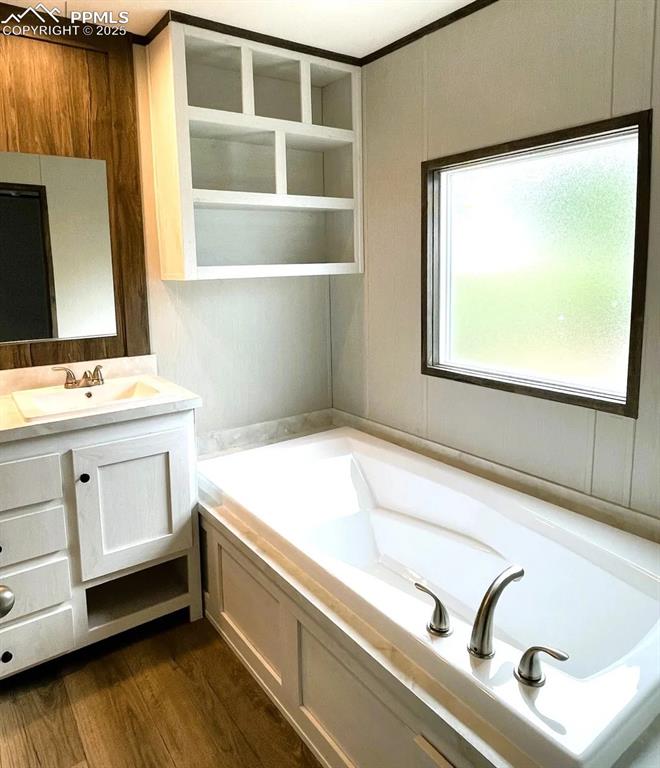 7490 Red Creek Springs Road Pueblo, CO 81005 - Photo 15 of 37 a bathroom with a sink and a mirror
