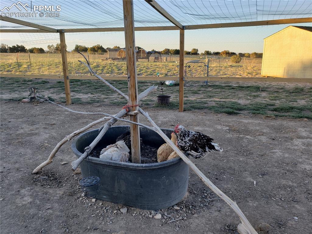 7490 Red Creek Springs Road Pueblo, CO 81005 - Photo 19 of 37 a view of a sitting area with furniture and a porch