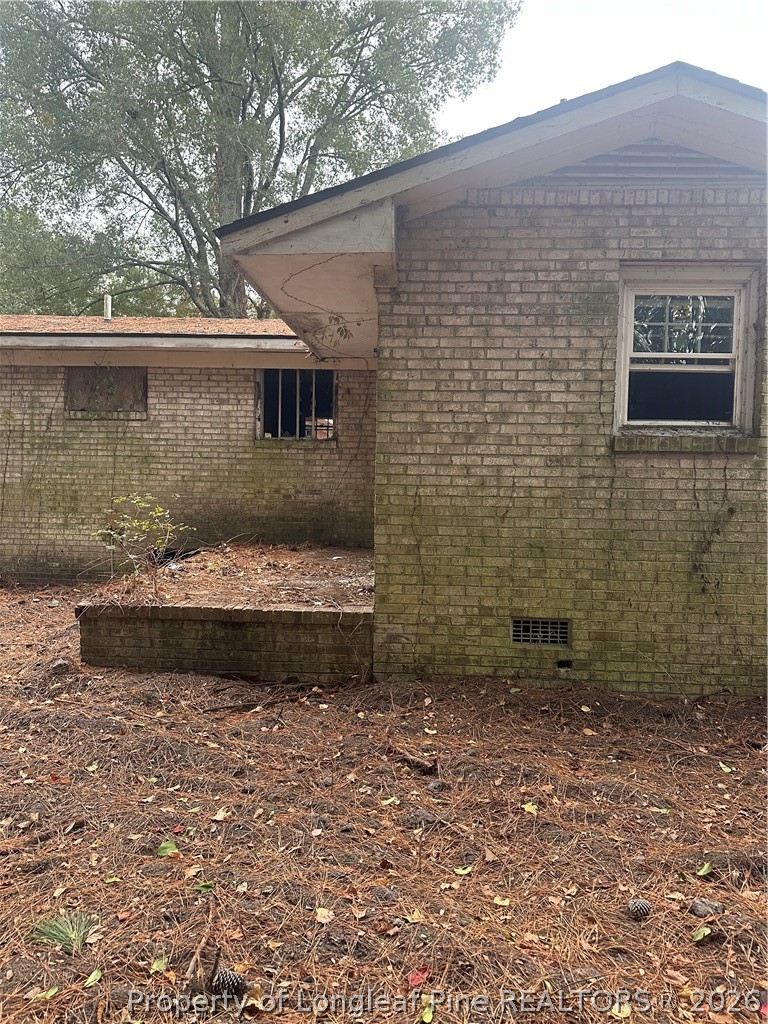 130 Wayne's Road Lumberton, NC 28358 - Photo 2 of 2 a view of a back yard of a house