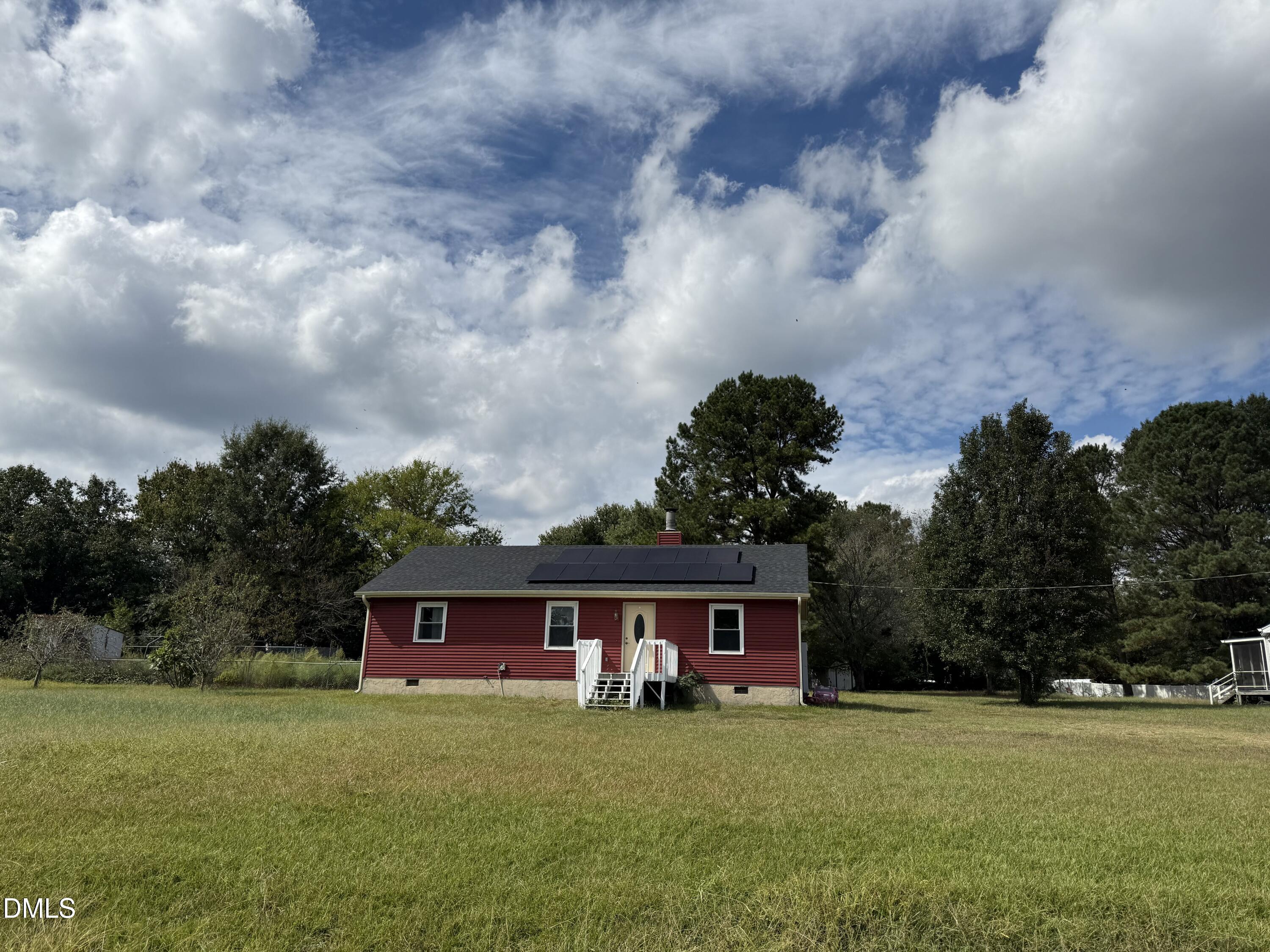 5509 Sandy Run Knightdale, NC 27545 - Photo 1 of 21 a view of a house with a yard