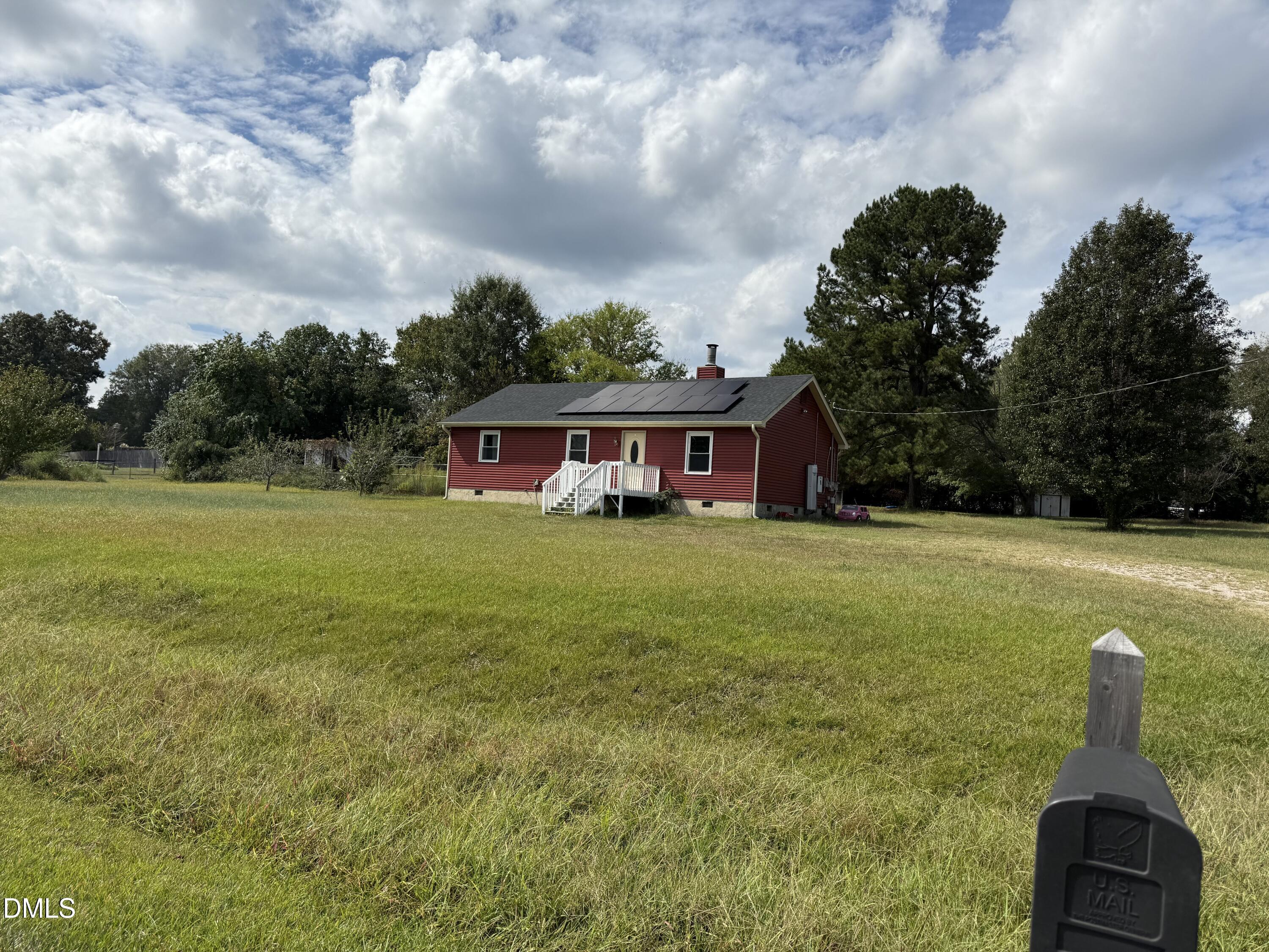 5509 Sandy Run Knightdale, NC 27545 - Photo 2 of 21 a front view of house with yard and entertaining space
