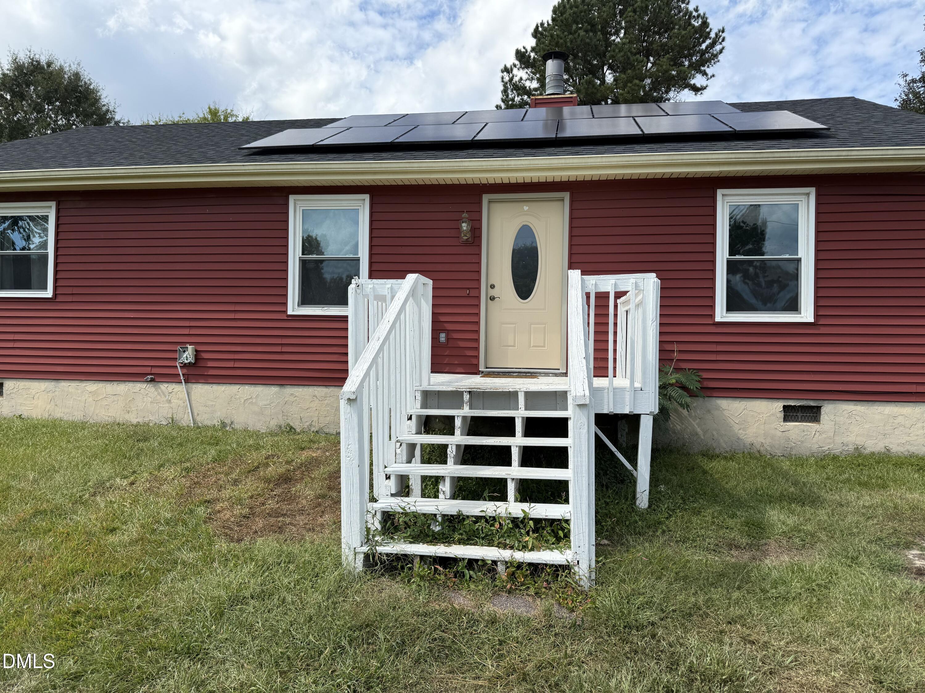 5509 Sandy Run Knightdale, NC 27545 - Photo 3 of 21 a front view of a house with a yard