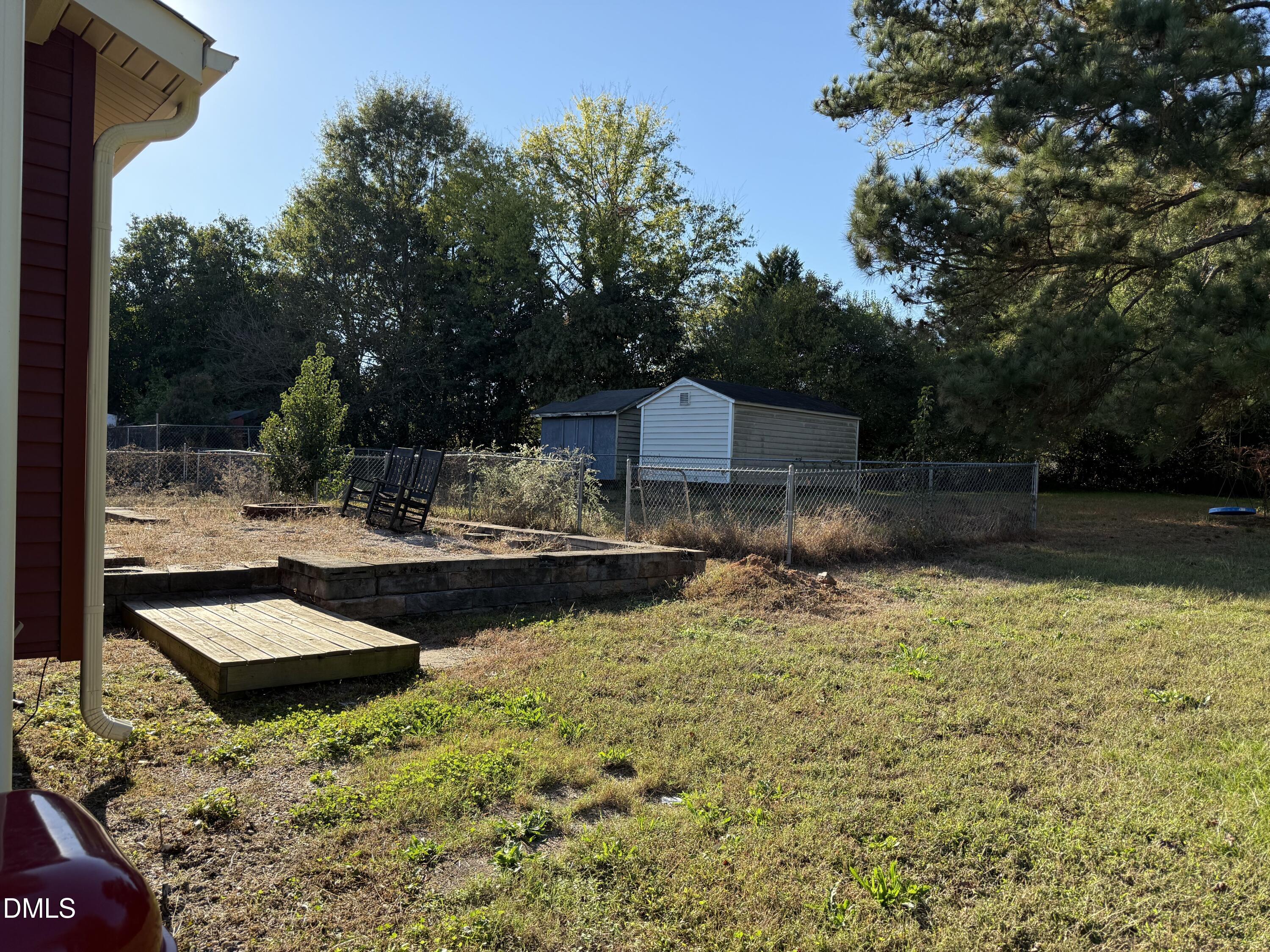 5509 Sandy Run Knightdale, NC 27545 - Photo 5 of 21 a view of a lake with a house