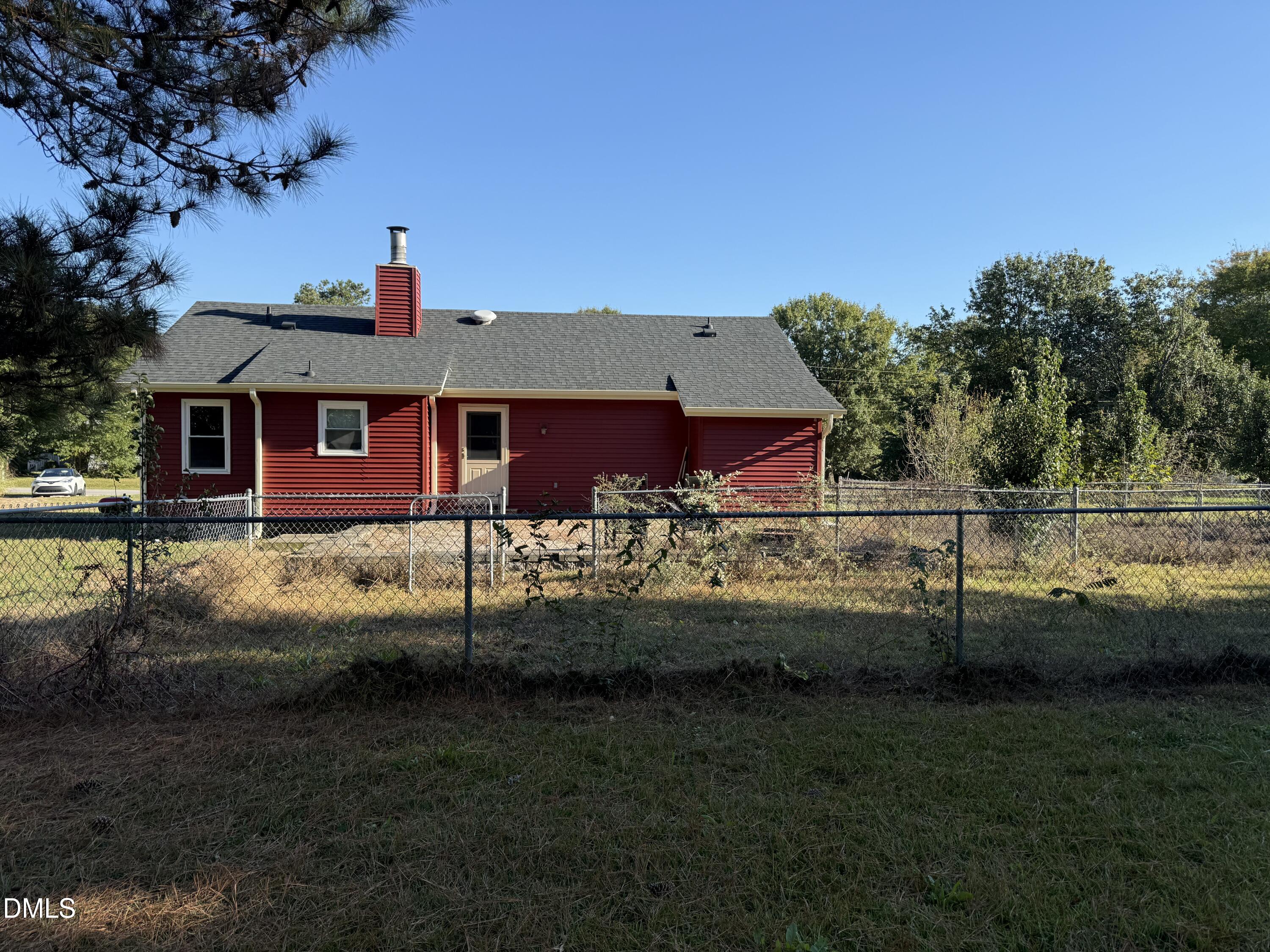 5509 Sandy Run Knightdale, NC 27545 - Photo 7 of 21 a front view of a house with a yard