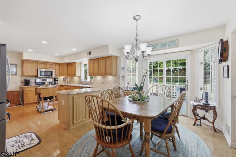 42 Copper Penny Road Flemington, NJ 08822 - Photo 12 of 39 a view of a dining room with furniture window and outside view
