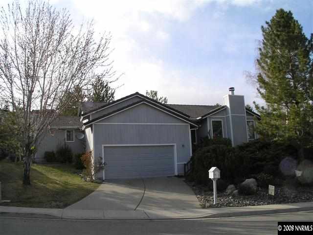 2601 Chaparral Drive Reno, NV 89509 - Photo 1 of 5 a front view of a house with garden