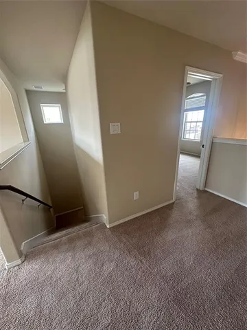 a bathroom with a double vanity sink mirror and shower