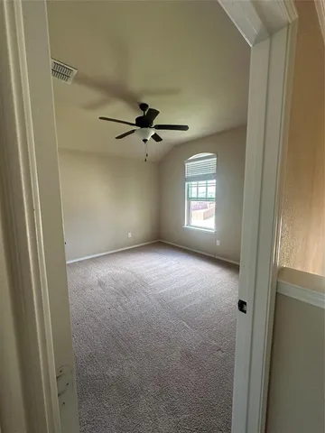 an empty room with a door