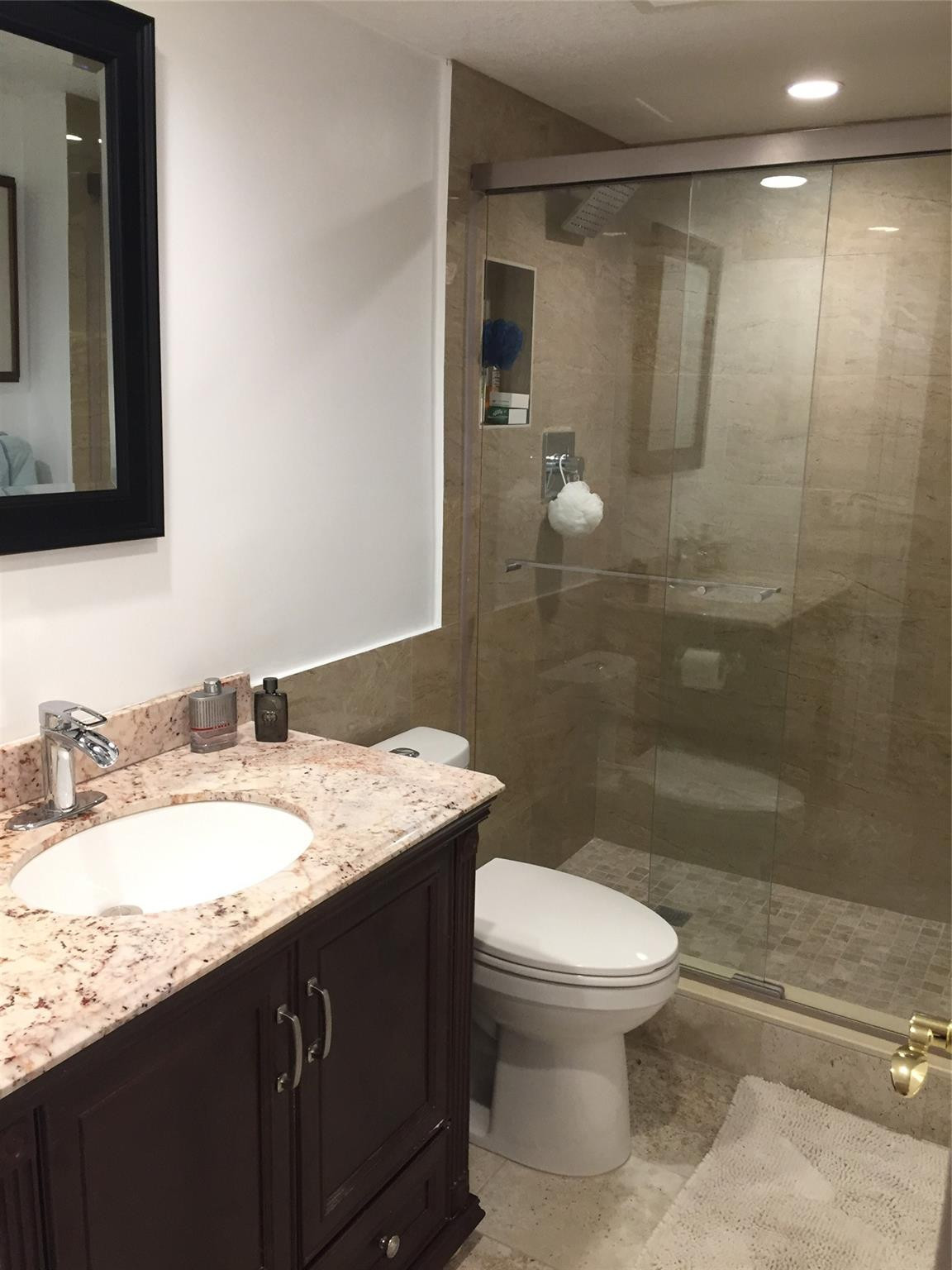 2121 North Ocean Boulevard, Unit 1408W Boca Raton, FL 33431 - Photo 9 of 19 Guest bathroom