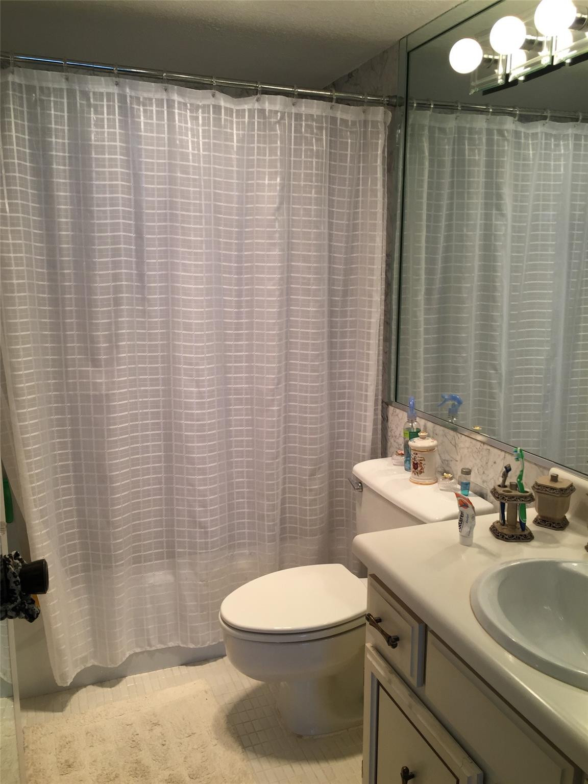 2121 North Ocean Boulevard, Unit 1408W Boca Raton, FL 33431 - Photo 10 of 19 main bathroom