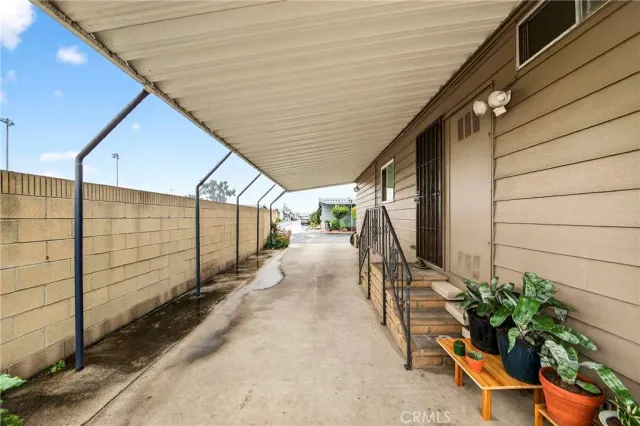 a backyard of a house with wooden fence