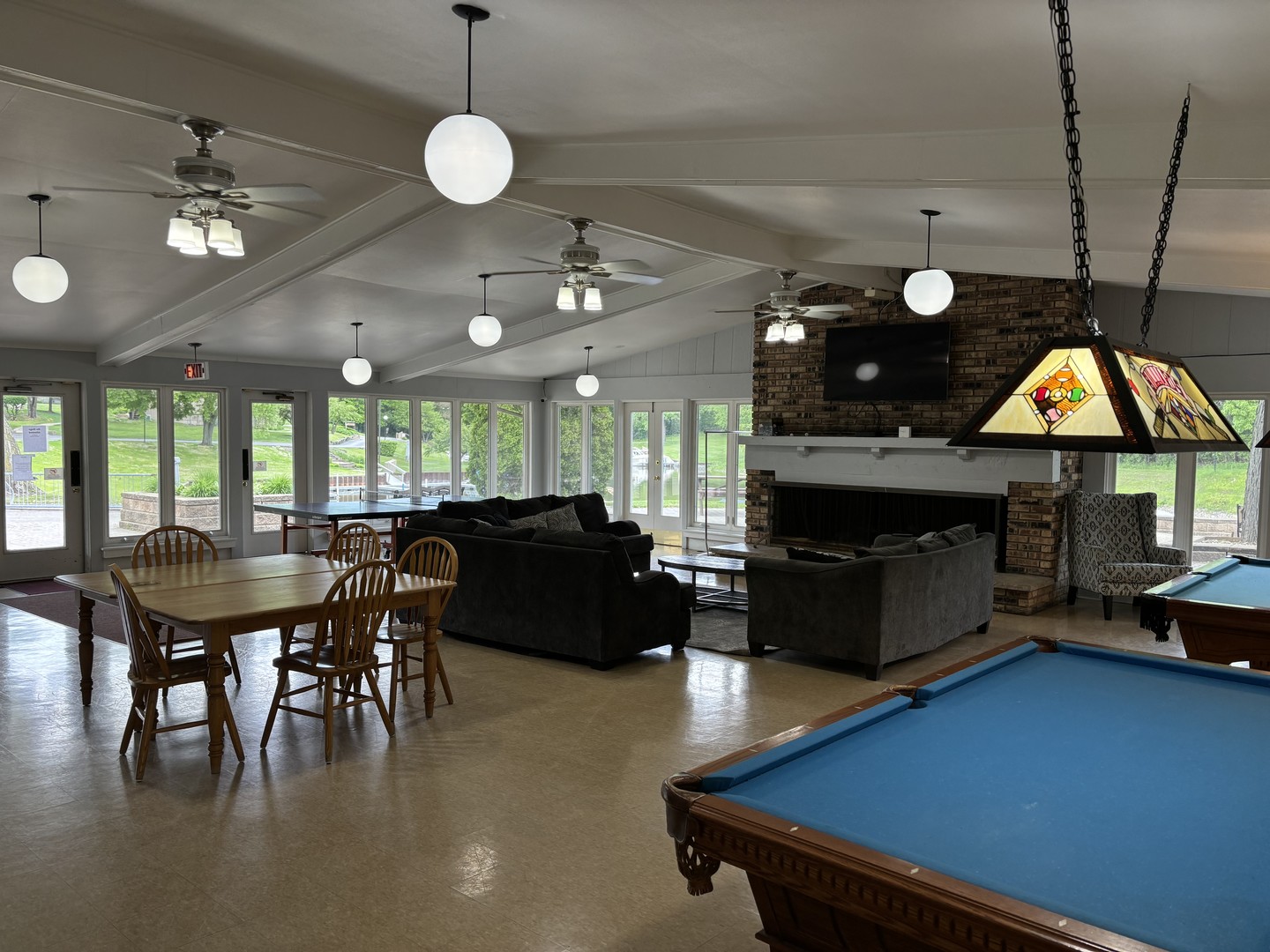 59 Vail Colony Street, Unit 3 Fox Lake, IL 60020 - Photo 19 of 24 a living room with furniture a dining table and kitchen view