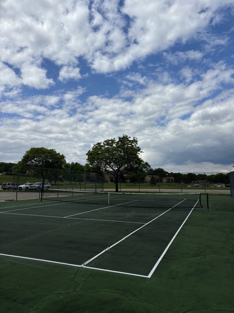 59 Vail Colony Street, Unit 3 Fox Lake, IL 60020 - Photo 23 of 24 a view of tennis court and yard